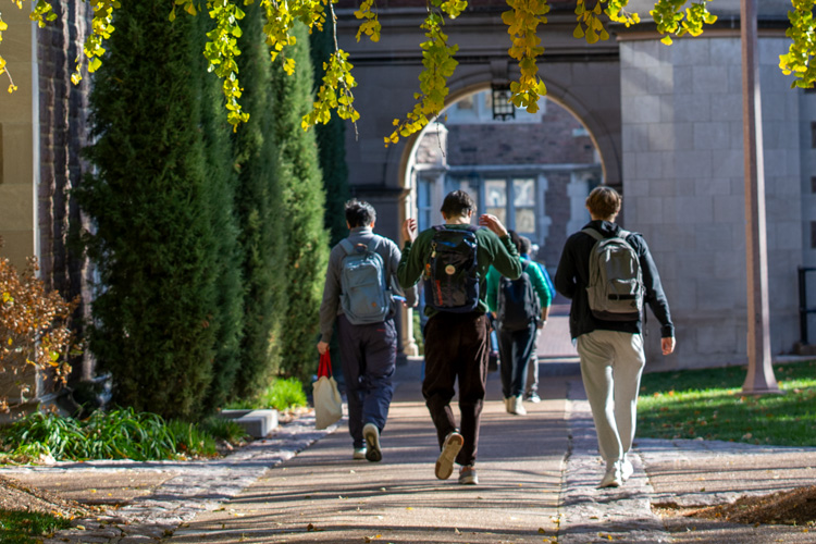 students walking on campus