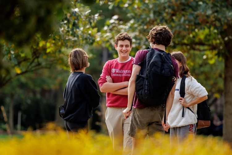 students talking on campus